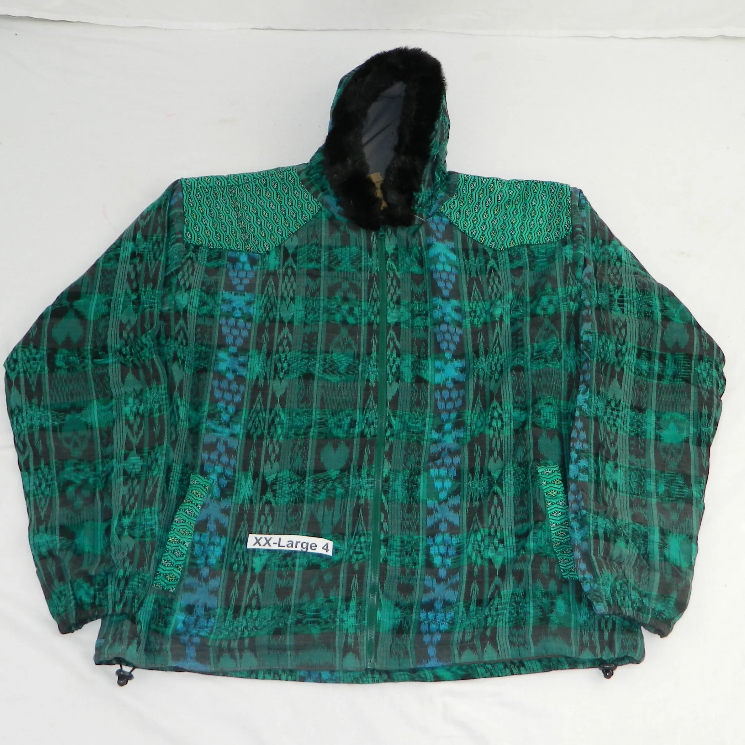 Hooded  jacket in native Ikat and brocade fleece lined with fur hood