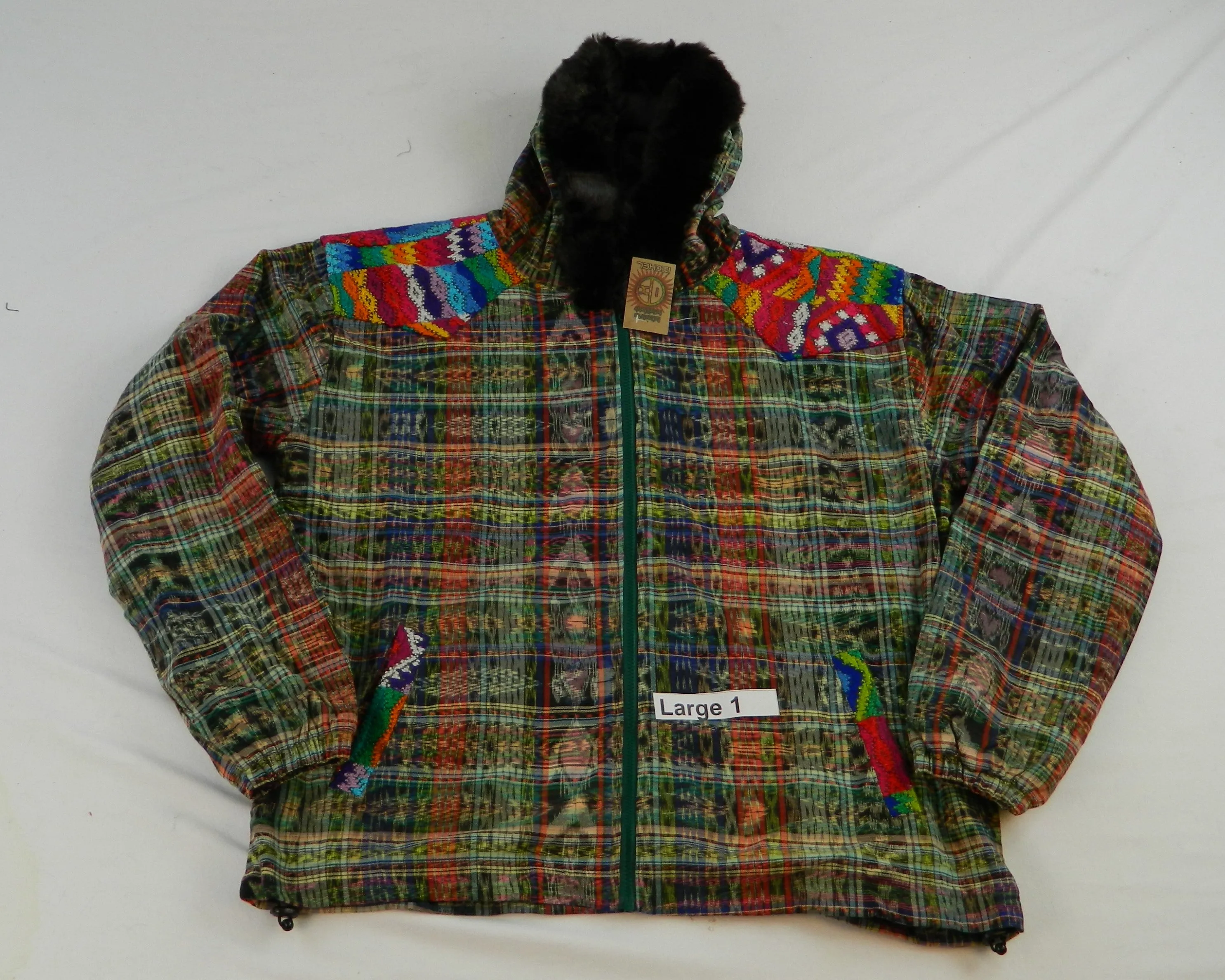 Hooded  jacket in native Ikat and brocade fleece lined with fur hood