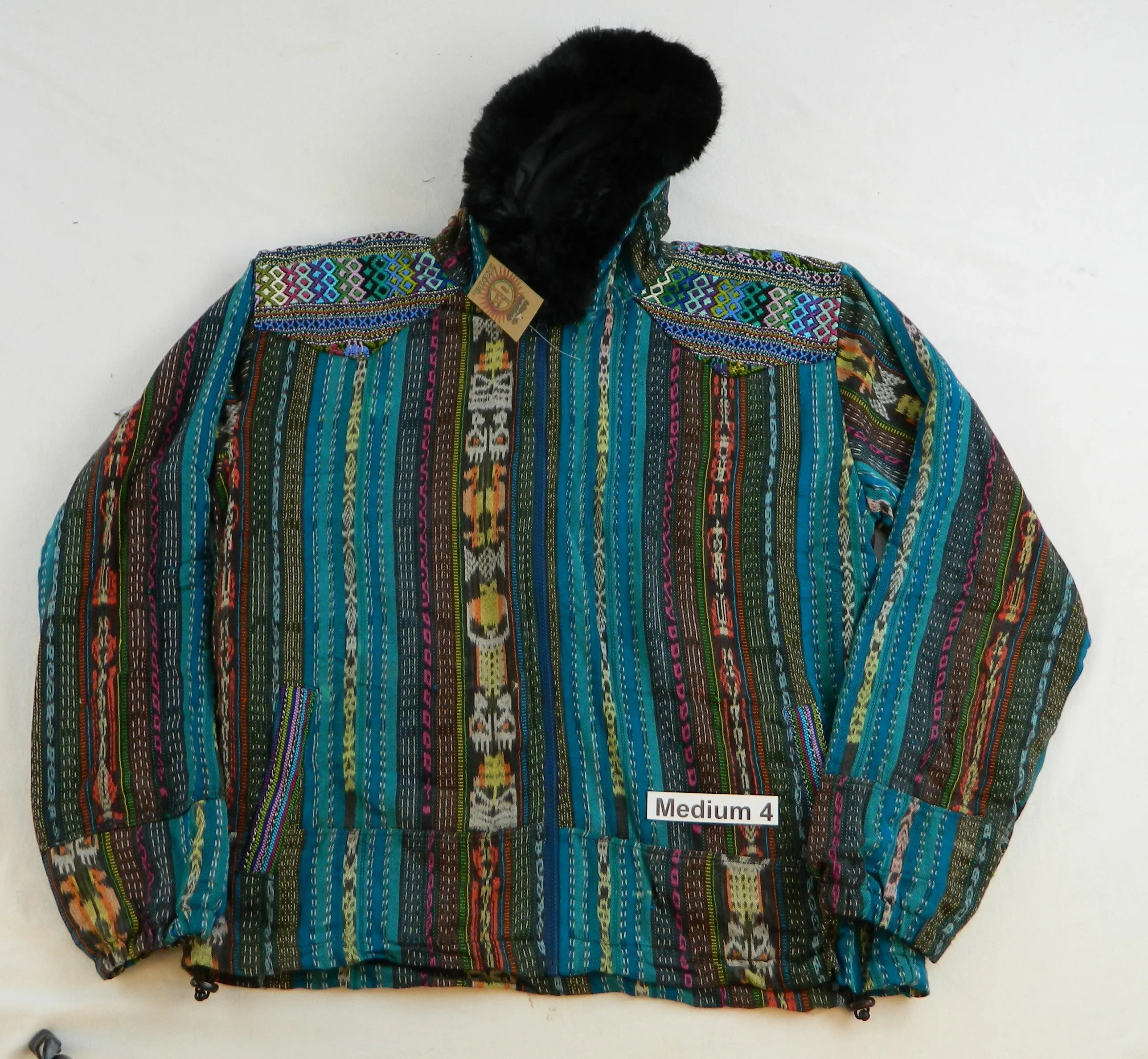 Hooded  jacket in native Ikat and brocade fleece lined with fur hood