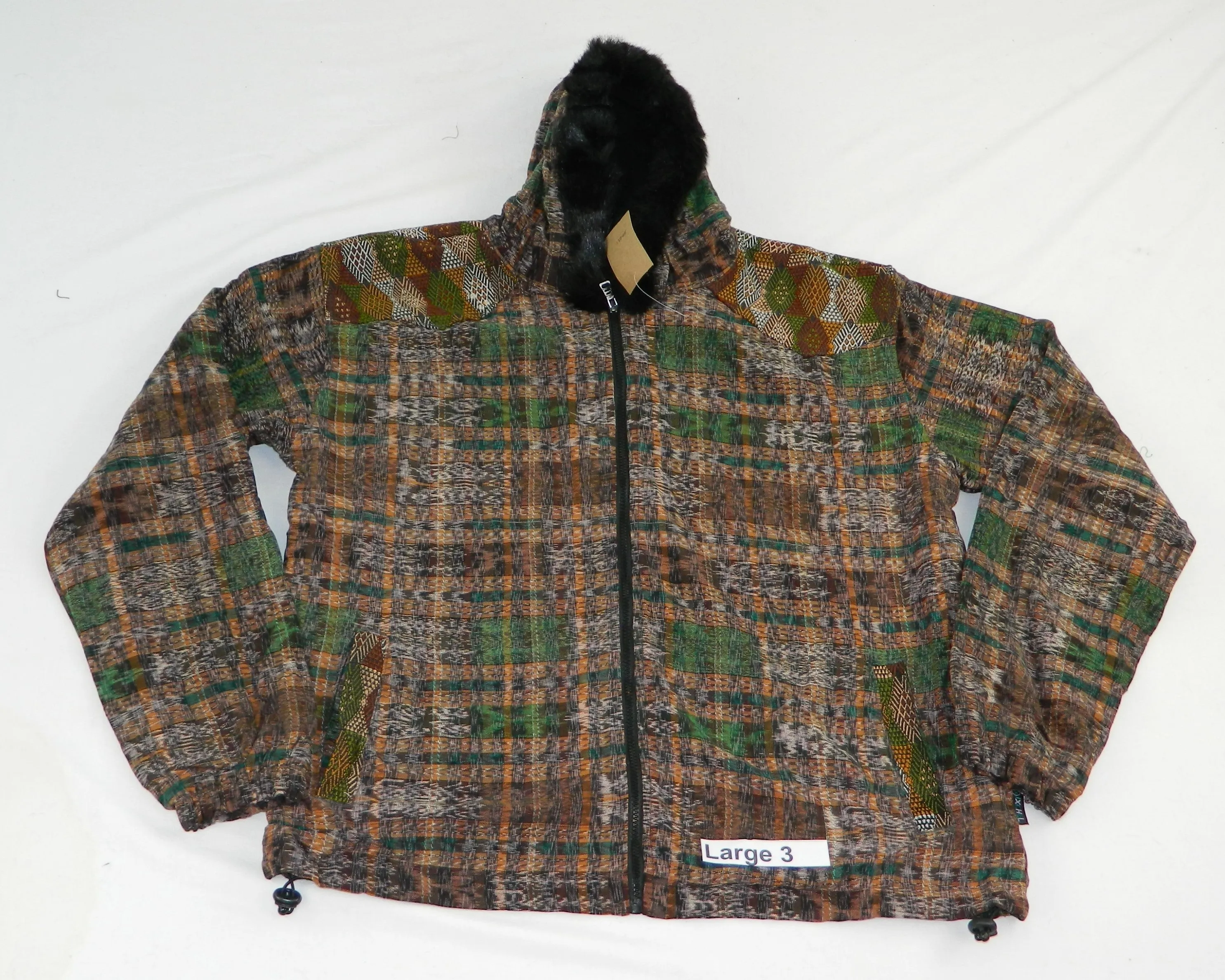 Hooded  jacket in native Ikat and brocade fleece lined with fur hood