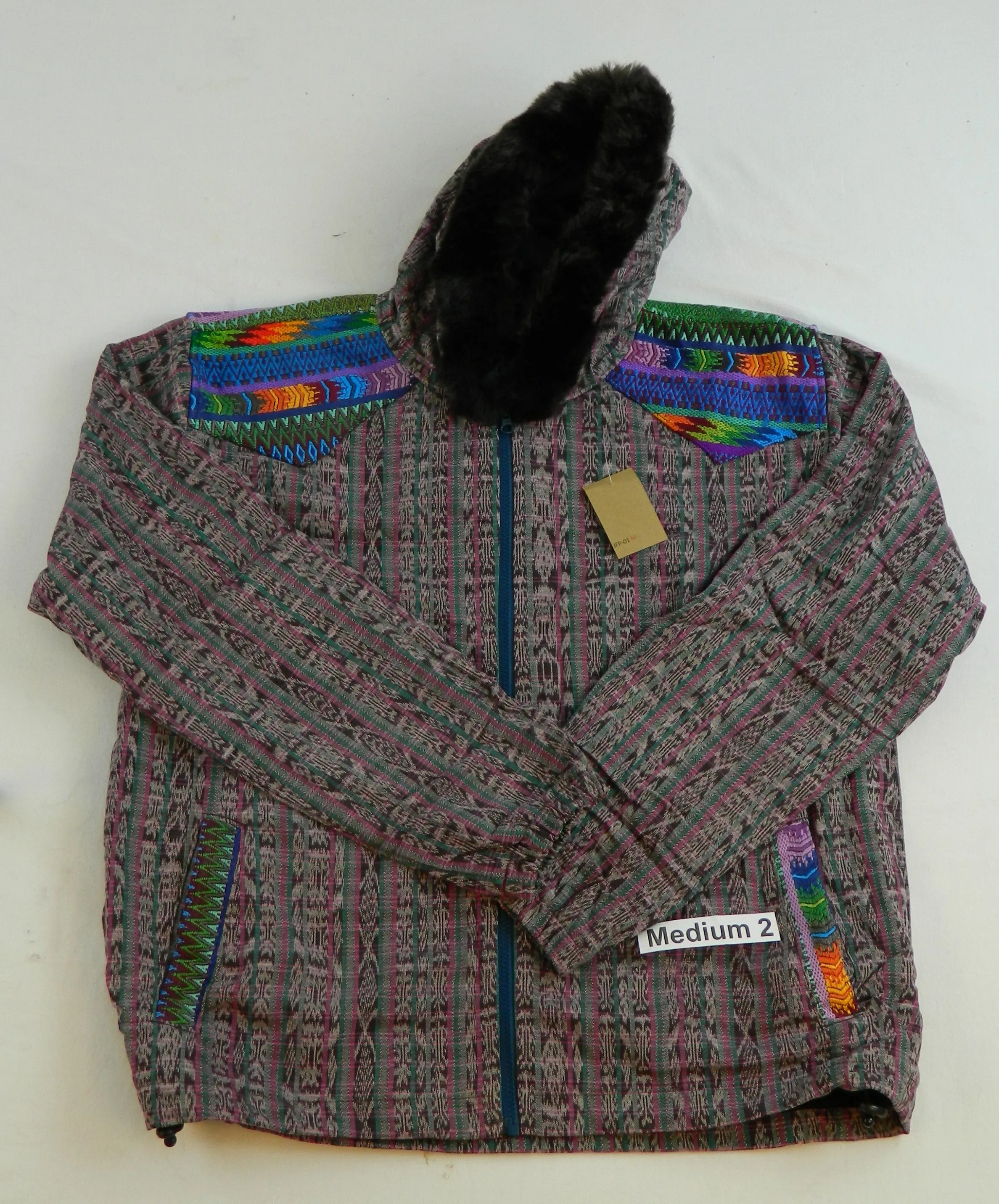 Hooded  jacket in native Ikat and brocade fleece lined with fur hood