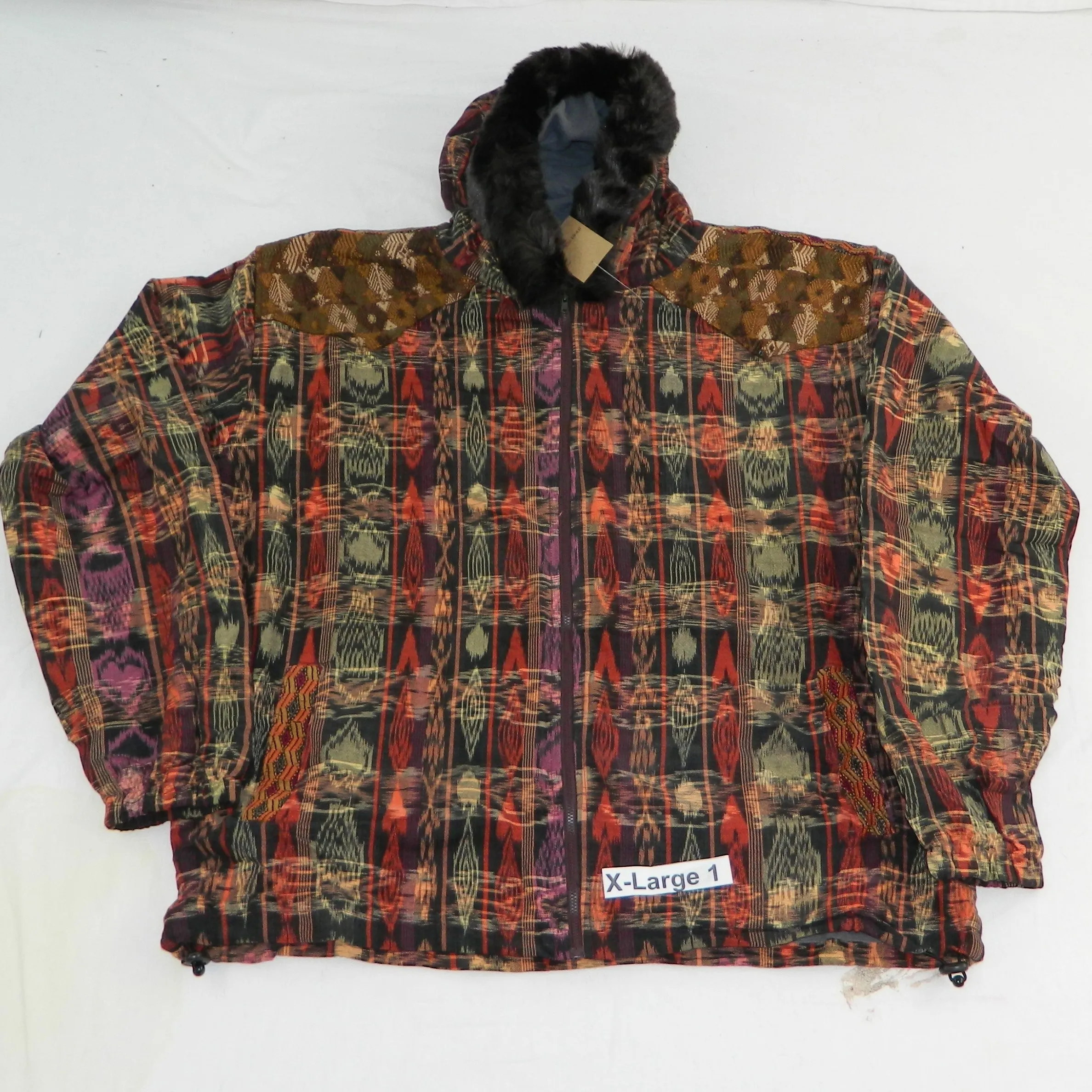 Hooded  jacket in native Ikat and brocade fleece lined with fur hood