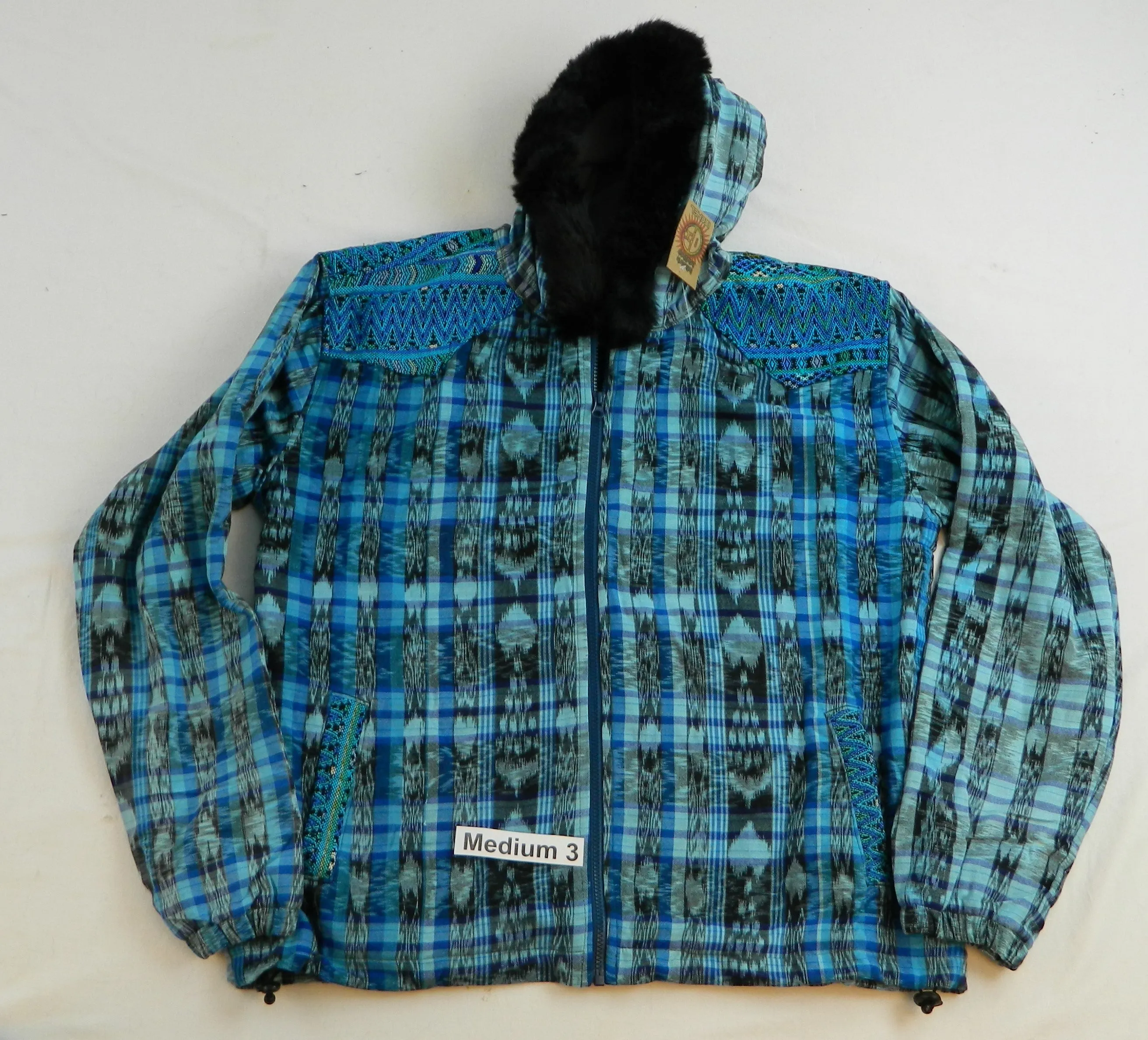 Hooded  jacket in native Ikat and brocade fleece lined with fur hood