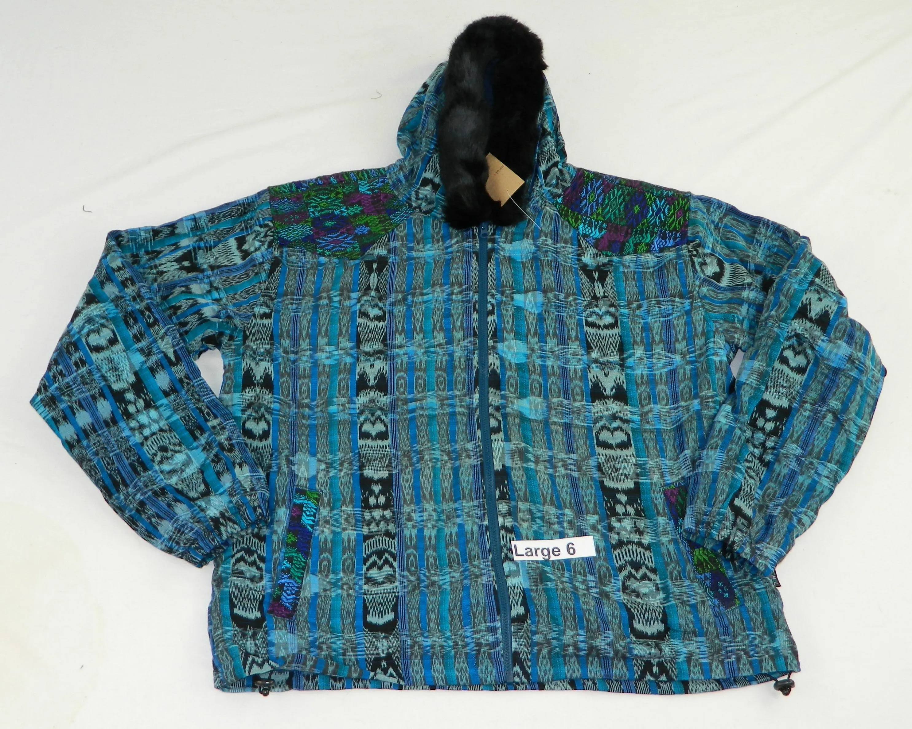 Hooded  jacket in native Ikat and brocade fleece lined with fur hood