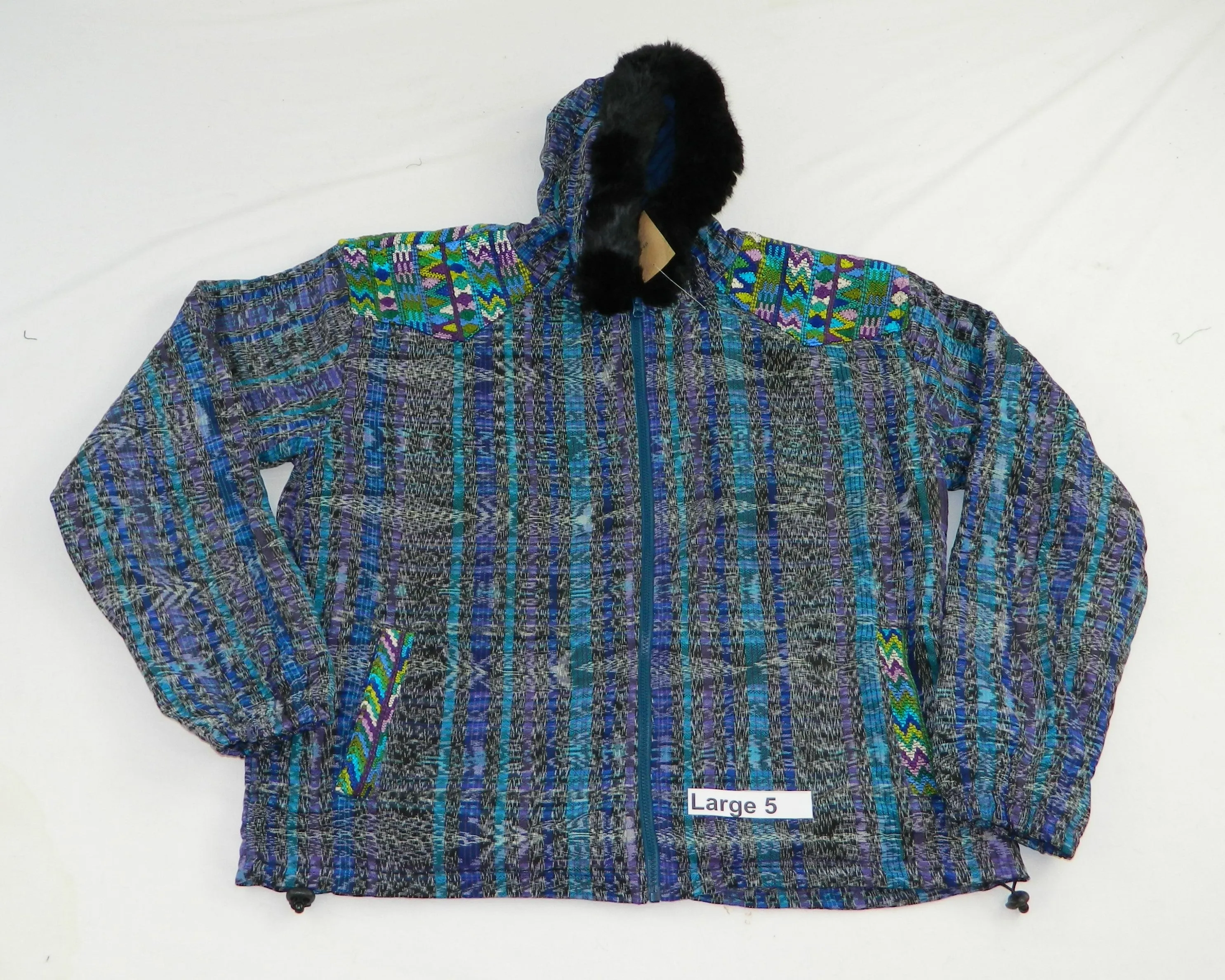 Hooded  jacket in native Ikat and brocade fleece lined with fur hood