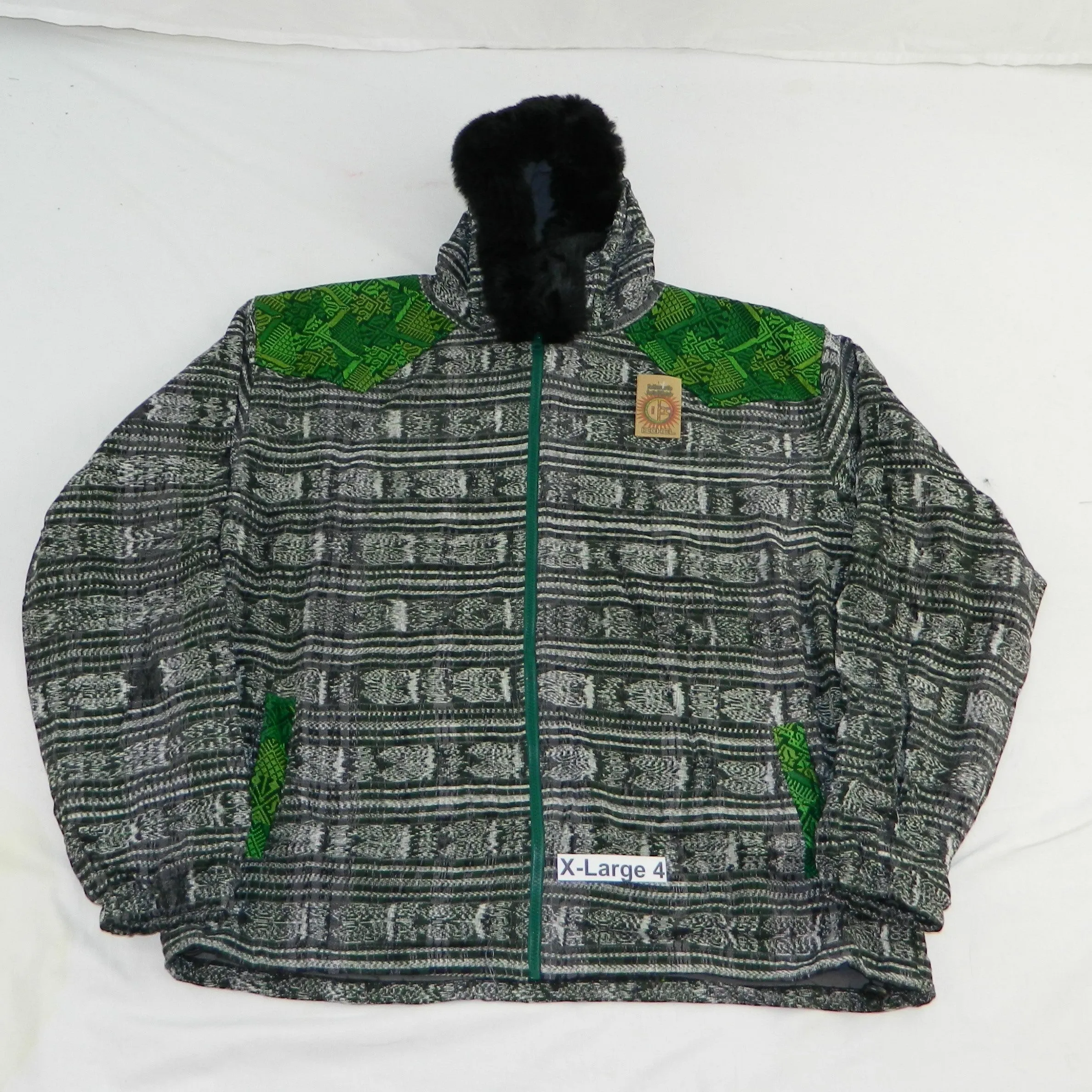 Hooded  jacket in native Ikat and brocade fleece lined with fur hood