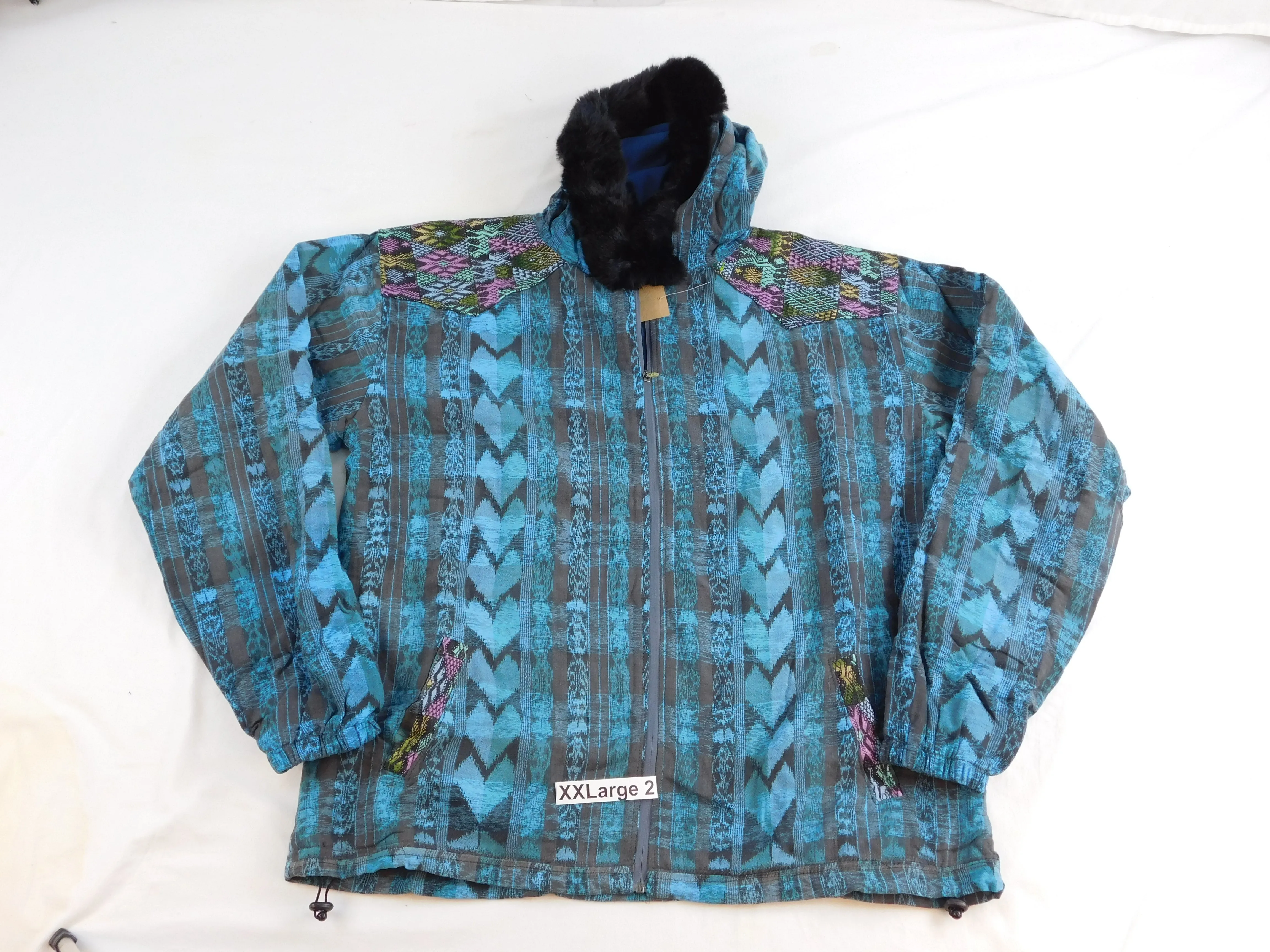 Hooded  jacket in native Ikat and brocade fleece lined with fur hood