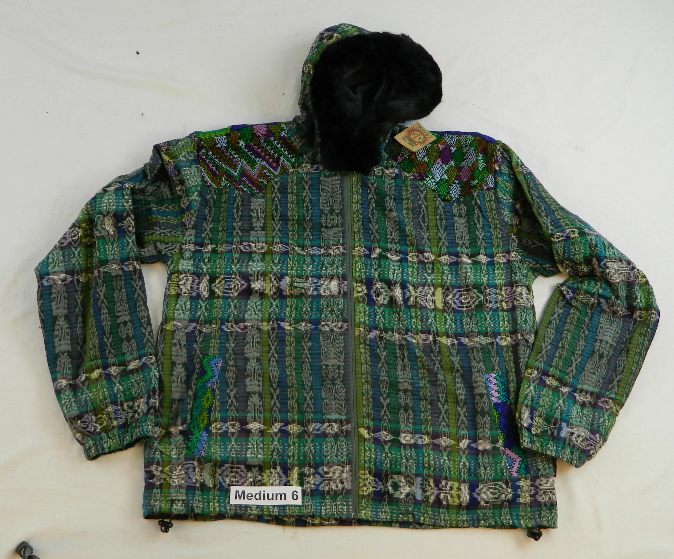 Hooded  jacket in native Ikat and brocade fleece lined with fur hood