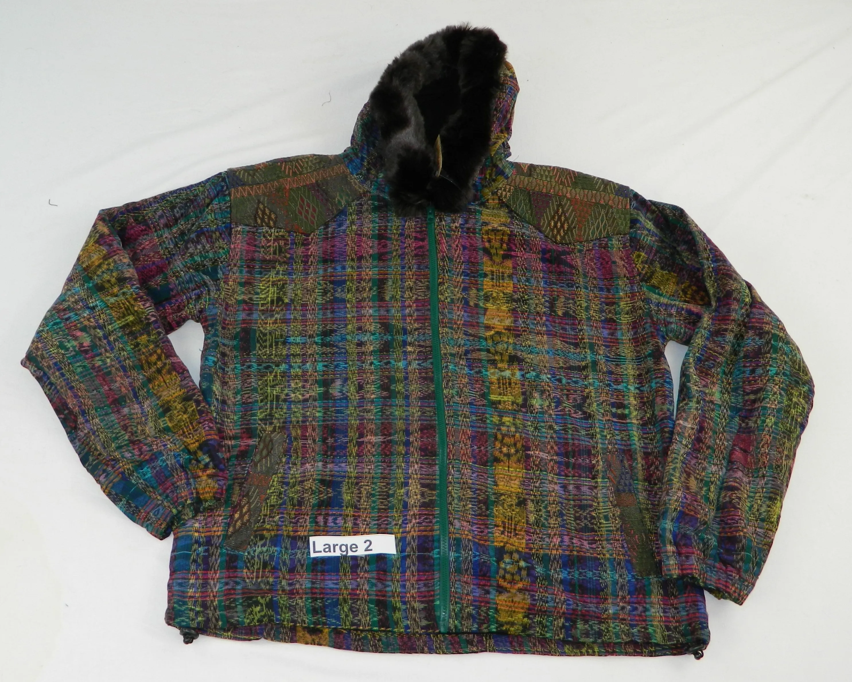 Hooded  jacket in native Ikat and brocade fleece lined with fur hood