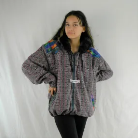 Hooded  jacket in native Ikat and brocade fleece lined with fur hood